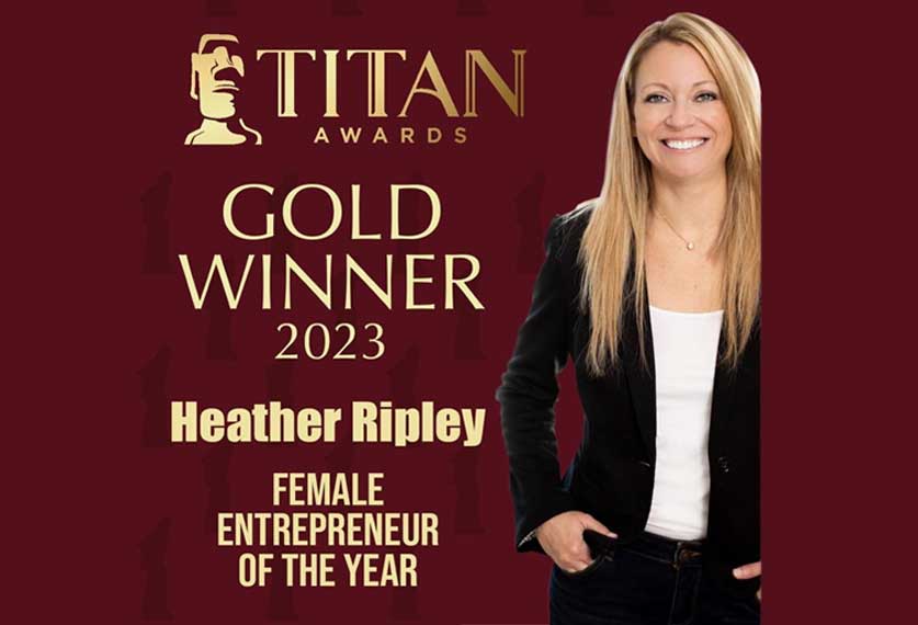 Heather Ripley Draped with Gold Win for Female Entrepreneur of the Year of Business 5 -10 Years!
